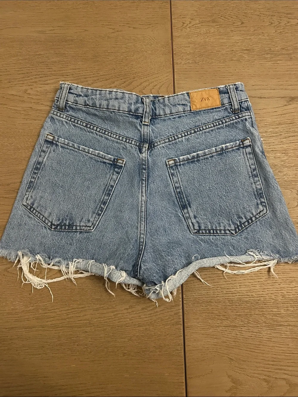 Zara Light Blue Distressed Denim Shorts